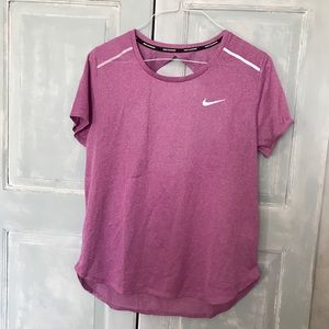 Nike workout top in pinkish / mauve size Large (L) . Open back is flattering